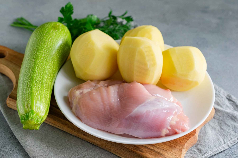 Simple chicken casserole with zucchini and potatoes